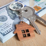 Real,Estate,Investing,Concept.,American,Dollar,,Cash,Or,Housing.,Keys
